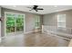 Bright upstairs living room with sliding glass doors leading to a deck, nice natural light at 14474 Treasure Creek Ln, Fishers, IN 46038
