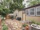 Inviting backyard with a stone patio, ideal for enjoying outdoor activities and gatherings at 1532 E Markwood Ave, Indianapolis, IN 46227