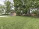 Spacious backyard with lush greenery, offering a serene and private outdoor space at 1532 E Markwood Ave, Indianapolis, IN 46227
