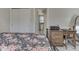 Comfortable bedroom with ensuite bathroom, closet, and ample natural light at 1532 E Markwood Ave, Indianapolis, IN 46227