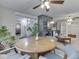 Open dining area with access to the living room and a view of the staircase at 1532 E Markwood Ave, Indianapolis, IN 46227