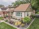 Well-maintained home featuring manicured landscaping, a hot tub, and a detached garage at 1532 E Markwood Ave, Indianapolis, IN 46227