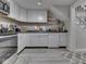 Well-equipped kitchen with white cabinetry, modern appliances, and great counter space at 1532 E Markwood Ave, Indianapolis, IN 46227