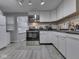 Bright kitchen with stainless steel appliances, ample cabinet space, and natural light at 1532 E Markwood Ave, Indianapolis, IN 46227
