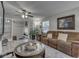 Inviting living room with a comfortable brown couch and stylish decor at 1532 E Markwood Ave, Indianapolis, IN 46227