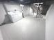 This basement features a washer and dryer hookup area and stairs leading to the upper levels at 1556 N Euclid Ave, Indianapolis, IN 46201