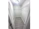 Walk-in closet with wire shelving and vinyl flooring at 1556 N Euclid Ave, Indianapolis, IN 46201