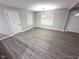Spacious empty room with plenty of natural light and neutral paint at 1556 N Euclid Ave, Indianapolis, IN 46201