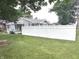 View of the house, fence and front yard at 1556 N Euclid Ave, Indianapolis, IN 46201