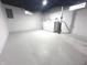 The unfinished basement includes a laundry area with a washer and dryer hookups at 1556 N Euclid Ave, Indianapolis, IN 46201