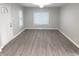 Living room with new vinyl flooring at 1556 N Euclid Ave, Indianapolis, IN 46201