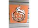 Little Flower neighborhood sign with a simple white flower illustration on a orange background at 1556 N Euclid Ave, Indianapolis, IN 46201
