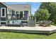 Multi-level backyard deck with comfortable seating, ideal for enjoying outdoor living at 17138 Joliet Rd, Westfield, IN 46074