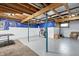 Unfinished basement space, offering potential for customization with visible beams and infrastructure at 17138 Joliet Rd, Westfield, IN 46074