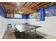 Spacious basement area features a ping pong table, creating a recreational space at 17138 Joliet Rd, Westfield, IN 46074