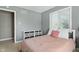 Relaxing bedroom featuring a window, closet, neutral decor and plush bedding at 17138 Joliet Rd, Westfield, IN 46074