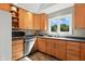 Well-lit kitchen featuring stainless steel appliances and wooden cabinets at 17138 Joliet Rd, Westfield, IN 46074