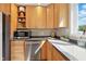 A well-appointed kitchen with stainless steel appliances and plenty of cabinet space at 17138 Joliet Rd, Westfield, IN 46074