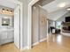 Hallway view of the living room featuring hardwood floors and a vaulted ceiling at 17138 Joliet Rd, Westfield, IN 46074