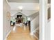 Bright living room with vaulted ceiling, brick fireplace, and hardwood floors at 17138 Joliet Rd, Westfield, IN 46074