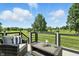 Comfortable outdoor deck setting with views of lush green space, ideal for relaxation and gatherings at 17138 Joliet Rd, Westfield, IN 46074