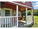 Exterior view of a cozy porch with a swing, offering a relaxing outdoor space at 17138 Joliet Rd, Westfield, IN 46074