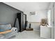 View of room featuring a large wardrobe, sofa, and an air conditioner, offering versatile usage at 17138 Joliet Rd, Westfield, IN 46074