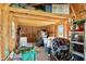 Interior of a shed with wooden walls, windows, and miscellaneous storage items at 17138 Joliet Rd, Westfield, IN 46074