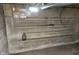 Unfinished basement space with concrete walls and shelving, great for storage at 2157 Sugar Grove Ave, Indianapolis, IN 46202