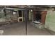 Unfinished basement with painted brick walls and concrete floor at 2157 Sugar Grove Ave, Indianapolis, IN 46202