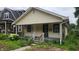 Charming single-Gathering home featuring a cozy front porch and small yard at 2157 Sugar Grove Ave, Indianapolis, IN 46202