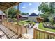 Picturesque back yard featuring a patio, fire pit, lush lawn and raised garden beds at 2325 N Talbott St, Indianapolis, IN 46205