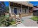 Charming backyard patio with stairs leading to the deck, perfect for outdoor relaxation at 2325 N Talbott St, Indianapolis, IN 46205