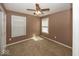 The bedroom features carpet and two large windows allowing natural light at 2325 N Talbott St, Indianapolis, IN 46205