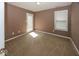 A bedroom with carpet and natural light. Featuring a large closet at 2325 N Talbott St, Indianapolis, IN 46205