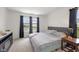 Bedroom featuring natural light, a comfortable bed, and stylish side tables at 24416 Kercheval St, Sheridan, IN 46069
