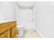 Bathroom with neutral tile flooring and a shower-tub combo with white trim at 2895 E 600 S, Markleville, IN 46056