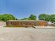 Charming single-story home with wooden deck and gravel driveway at 2895 E 600 S, Markleville, IN 46056