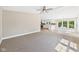 Spacious living room with neutral colors and an open concept layout leading to kitchen at 2895 E 600 S, Markleville, IN 46056