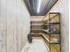 Walk-in pantry with metal shelving and wood paneling at 2895 E 600 S, Markleville, IN 46056