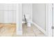 Toilet room with tiled floors and modern toilet at 2895 E 600 S, Markleville, IN 46056