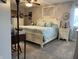 Spacious bedroom with a ceiling fan, stylish decor, and a plush bed at 2925 Morgan Trl, Martinsville, IN 46151