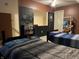 Bedroom with two beds and a decorative chalkboard wall, perfect for creativity at 2925 Morgan Trl, Martinsville, IN 46151