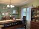 Cozy dining room with natural light and shelving creates an inviting atmosphere at 2925 Morgan Trl, Martinsville, IN 46151