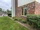 A brick and siding home exterior with well-maintained landscaping and natural light at 2925 Morgan Trl, Martinsville, IN 46151