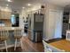 Spacious kitchen with stainless steel appliances and a seamless view to the dining room at 2925 Morgan Trl, Martinsville, IN 46151