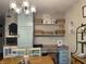 View of the kitchen area showcasing built in desk, cabinets, and an elegant chandelier at 2925 Morgan Trl, Martinsville, IN 46151