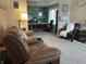 Comfortable living room provides ample seating and an open view into the dining area at 2925 Morgan Trl, Martinsville, IN 46151