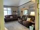 Spacious living area with vaulted ceilings, lots of seating, and natural light at 2925 Morgan Trl, Martinsville, IN 46151