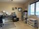 Bright home office with storage shelves, a desk, and a window providing natural light at 2925 Morgan Trl, Martinsville, IN 46151
